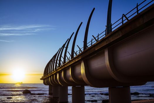 Umhlanga Pier in Durban South Africa in the Morning Sunrise over the Horison of the Indian Ocean