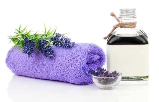 fresh lavender blossoms with Natural handmade lavender oil, on white background