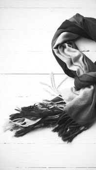 blue scarf over white wood table background black and white color