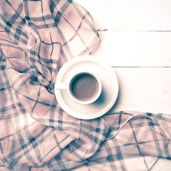 coffee and scarf background on white table vintage style