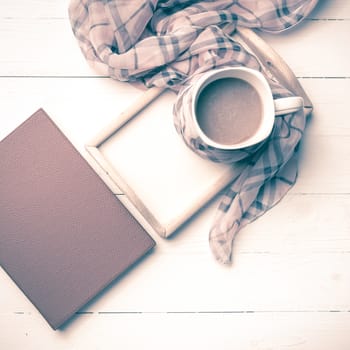 coffee and scarf background on white table vintage style