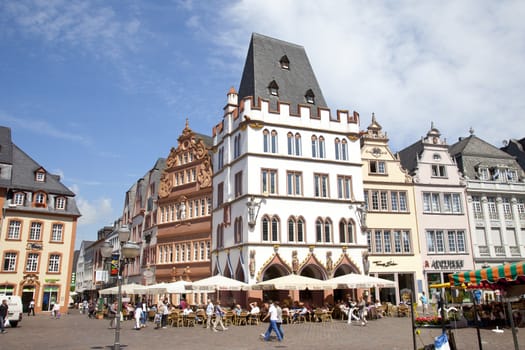 TRIER, GERMANY - JULY 3, 2012 View at tradiontal houses at Hauptmarkt, Trier Germany. Trier is one of the oldest city in Germany with famous colorful houses