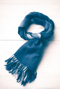 blue scarf over white wood table background vintage style