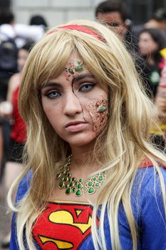 Sao Paulo, Brazil November 11 2015: An unidentified girl in Super Woman costumes in the annual event Zombie Walk in Sao Paulo Brazil.