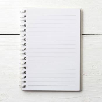 notepad over white table