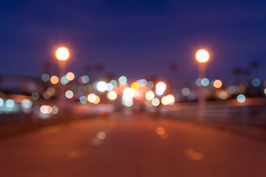 Magical glowing blurred out of focus urban night shot  background street  lights effect.