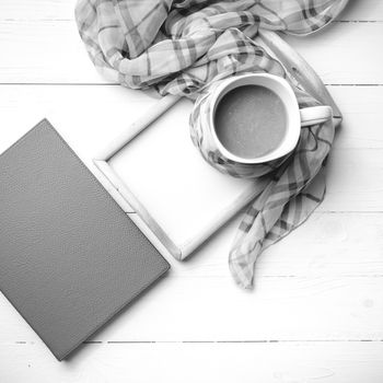 coffee and scarf background on white table black and white color