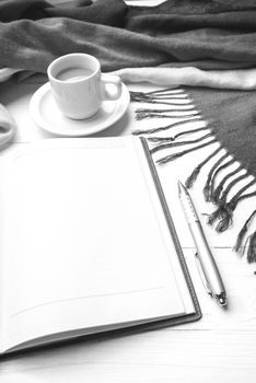 coffee and scarf background on white table black and white color