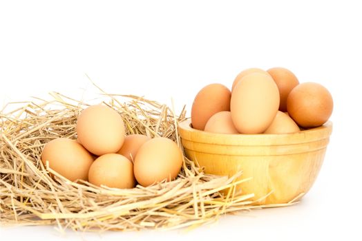 Egg, Chicken Eggs in a basket and a bowl isolate on white