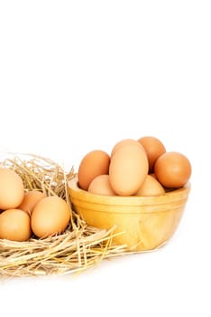 Egg, Chicken Eggs in a basket and a bowl isolate on white