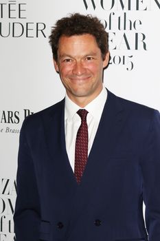 UNITED KINGDOM, London: Actor Dominic West poses during the Harper's Bazaar Women of the Year Awards at Claridge's, in London, on November 3, 2015.