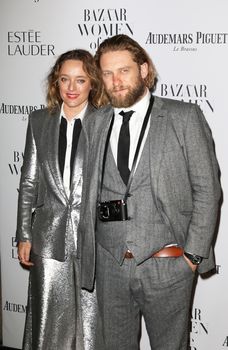 UNITED KINGDOM, London: Alice Temperley (L) poses during the Harper's Bazaar Women of the Year Awards at Claridge's, in London, on November 3, 2015.