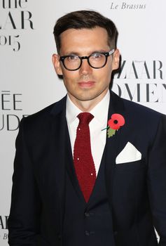 UNITED KINGDOM, London: Erdem Moralioglu poses during the Harper's Bazaar Women of the Year Awards at Claridge's, in London, on November 3, 2015.