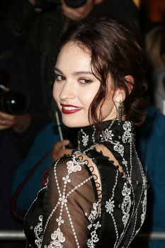 UNITED KINGDOM, London: Lily James poses during the Harper's Bazaar Women of the Year Awards at Claridge's, in London, on November 3, 2015.