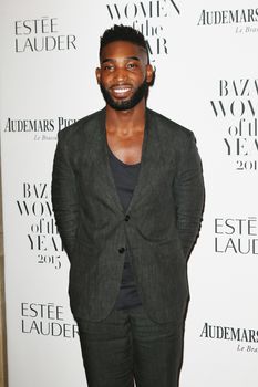 UNITED KINGDOM, London: Rapper Tinie Tempah poses during the Harper's Bazaar Women of the Year Awards at Claridge's, in London, on November 3, 2015.