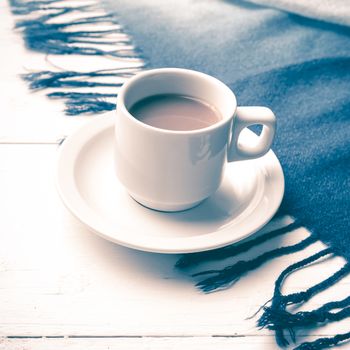 coffee and scarf background on white table vintage style