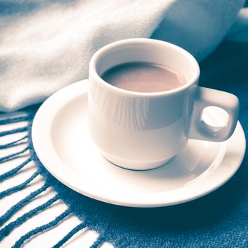 coffee and scarf background on white table vintage style