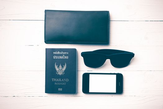 travel gadget over white table vintage style