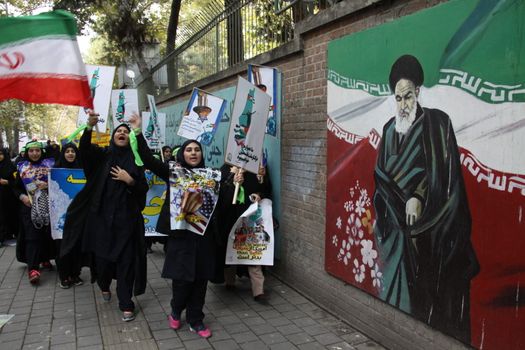 IRAN, Tehran: Protesters shout 'Down with USA' as hundreds of people march in front of the former US embassy in Tehran, during the '13 Aban' (4th of November in english), on November 4, 2015, to commemorate the anniversary of the 1979 US embassy taking.