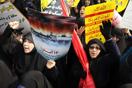 IRAN, Tehran: Protesters shout 'Down with USA' as hundreds of people march in front of the former US embassy in Tehran, during the '13 Aban' (4th of November in english), on November 4, 2015, to commemorate the anniversary of the 1979 US embassy taking.
