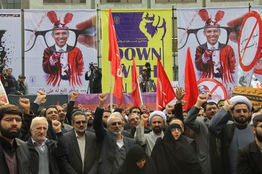 IRAN, Tehran: Protesters shout 'Down with USA' as hundreds of people march in front of the former US embassy in Tehran, during the '13 Aban' (4th of November in english), on November 4, 2015, to commemorate the anniversary of the 1979 US embassy taking.