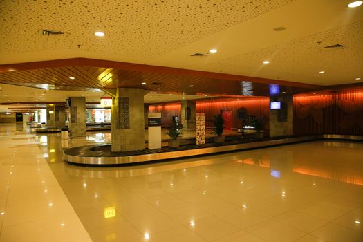 INDONESIA, Denpasar: The arrival area is empty in Bali's Ngurah Rai Airport in Denpasar on November 4, 2015. Indonesia will extend the closure of an international airport on popular Bali resort island to on November 5 due to ash from an erupting volcano, an official said on November 4, grounding more than 100 flights. 