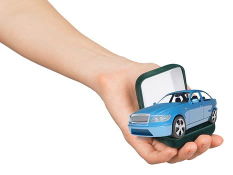 Empty ring box with car in humans hand on isolated white background