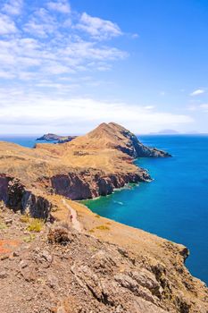View towards rock gate Ponta do Furado - the most easterly point of Madeira - peninsula Ponta de Sao Lourenco