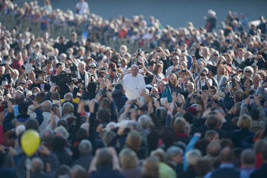 VATICAN: Pope Francis stands among the crowd after his weekly audience in St. Peter's Square at The Vatican on November 4, 2015 in Vatican City, Vatican.