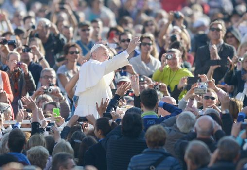 VATICAN: Pope Francis stands among the crowd after his weekly audience in St. Peter's Square at The Vatican on November 4, 2015 in Vatican City, Vatican.