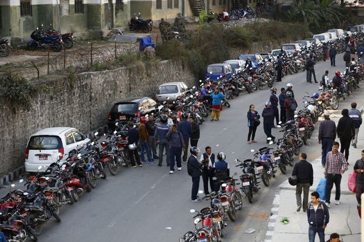 NEPAL, Kathmandu: Motorists wait in a queue for petrol near a petrol station in Kathmandu on November 4, 2015. Nepal signed a deal last week with China to import petroleum products, its embassy in Beijing said, as the Himalayan nation tries to boost supplies to deal with a deepening fuel crisis. The curfew imposed in Birgunj, Nepal after violent protests where one person was killed near the Shankaracharya Gate close to the Nepal-India border on Monday causing tight security for goods to arrive.