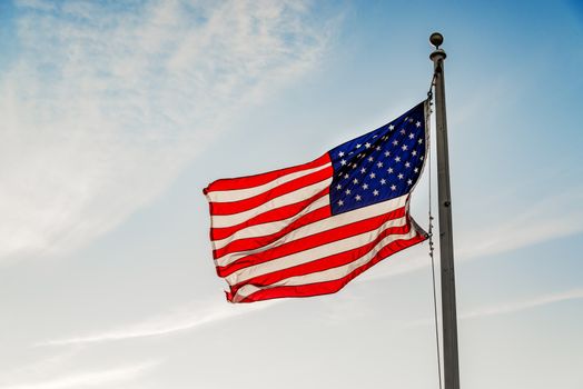 American flag star and stripes on the blue sky