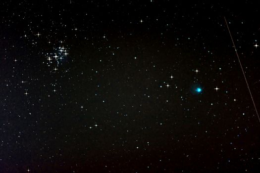 Starfield with Comet Lovejoy, Falling Star and Pleiades, Jan. 17, 2015 in Germany