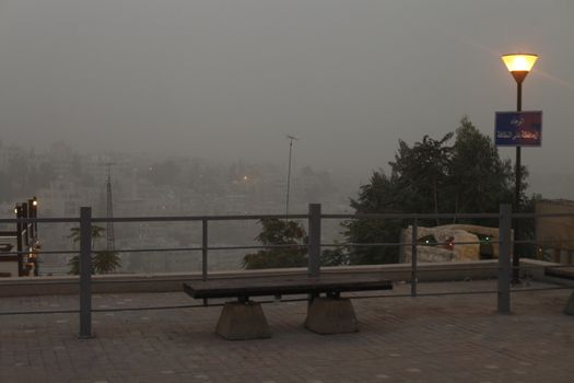 JORDAN, Amman : A thick sandstorm cloak the Jordan capital city Amman in Othman Bin Affan street and other regions in the Middle East on November 4, 2015, disrupting travel for the US first lady. 