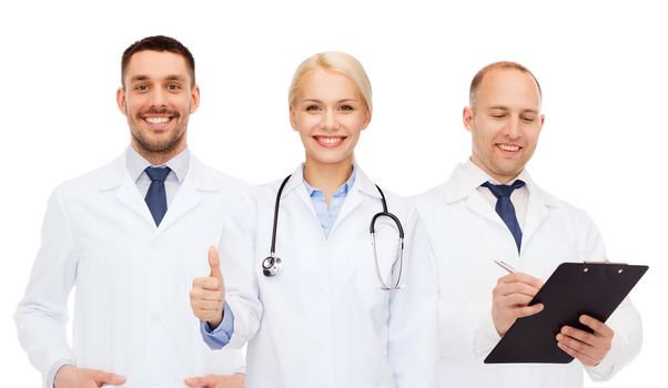 healthcare, people, gesture and medicine concept - group of doctors with stethoscope and clipboard showing thumbs up over white background