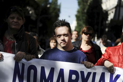GREECE, Athens: Disabled persons take part in a protest in Athens on November 4, 2015 to condemn the new planned cuts to their pensions and allowances. These cuts form part of the requirements of the country's creditors.