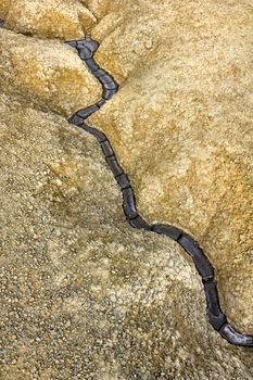 Texture of dried river mud in Berca Buzau Romania