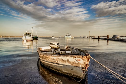 a small boat on the oceanic coast in Maine, USA