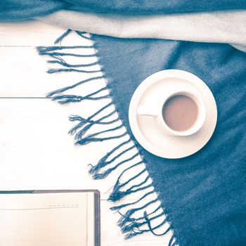 coffee and scarf background on white table vintage style