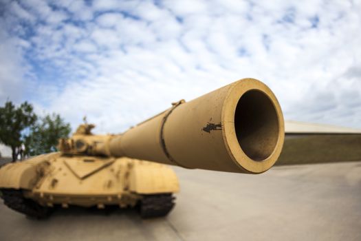 CALGARY CANADA JUN 13 2015:  The Military Museum organized "Summer Skirmish" event where an unidentified soldier is seen  in a historical Reenactment Battle. T-72 main battle tank on display.