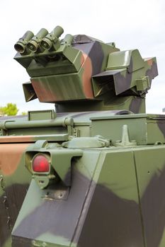 CALGARY CANADA JUN 13 2015:  The Military Museum organized "Summer Skirmish" event where an unidentified soldier is seen  in a historical Reenactment Battle. T-72 main battle tank on display.