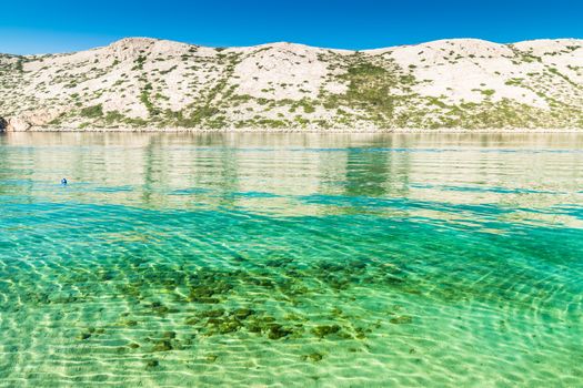 The pristine coastline and crystal clear water of the island of Rab, Croatia.