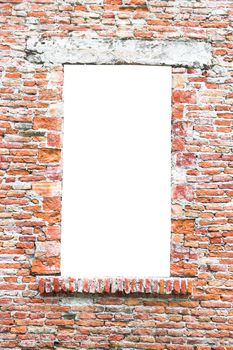 Old window of an abandoned house closed with bricks suitable as a frame or border.