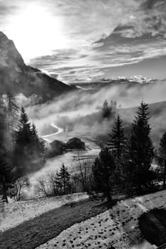 Mountain landscape shrouded in the morning fog.