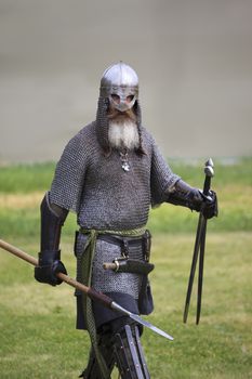 CALGARY CANADA JUN 13 2015: The Military Museum organized "Summer Skirmish" event where an unidentified soldier is seen in a historical Reenactment Battle. Viking solder in action.