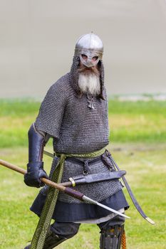 CALGARY CANADA JUN 13 2015: The Military Museum organized "Summer Skirmish" event where an unidentified soldier is seen in a historical Reenactment Battle. Viking solder in action.