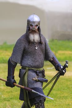 CALGARY CANADA JUN 13 2015: The Military Museum organized "Summer Skirmish" event where an unidentified soldier is seen in a historical Reenactment Battle. Viking solder in action.