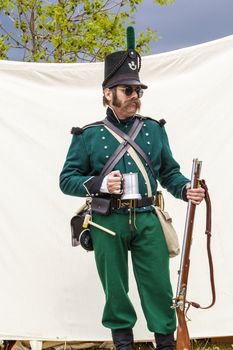 CALGARY CANADA JUN 13 2015:  The Military Museum organized "Summer Skirmish" event where an unidentified soldier is seen  in a historical Reenactment Battle.