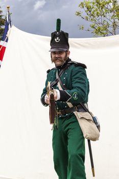 CALGARY CANADA JUN 13 2015:  The Military Museum organized "Summer Skirmish" event where an unidentified soldier is seen  in a historical Reenactment Battle.