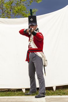 CALGARY CANADA JUN 13 2015:  The Military Museum organized "Summer Skirmish" event where an unidentified soldier is seen  in a historical Reenactment Battle.